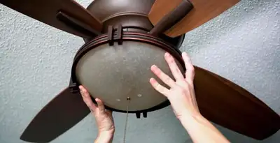 Ceiling fan repair and reinstallation on ceiling mount in Cambridge, MA