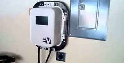 Electric car charger installation with wall-mounted EV charging station in Cambridge, MA