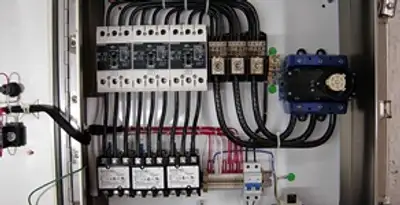 Electrical panel installation with organized circuit breakers and wiring in Cambridge, MA