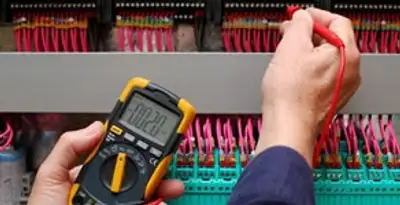 electrical service showing professional testing and troubleshooting of electrical panel by licensed electricians in Cambridge, MA