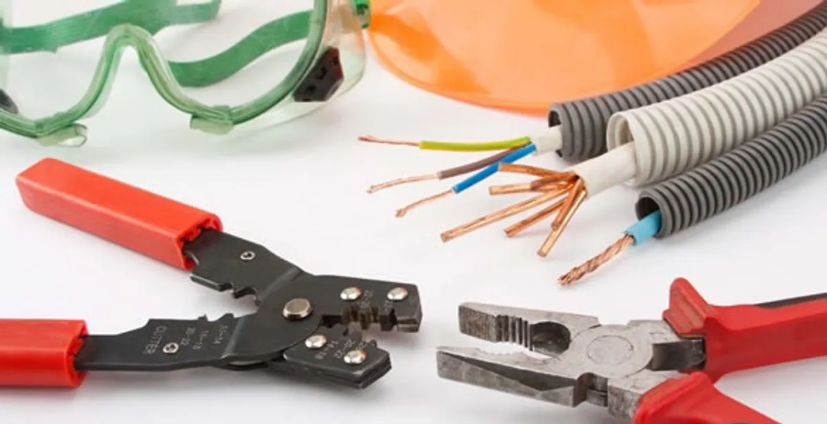 Electrical wiring repair with professional tools and safety equipment in Somerville, MA