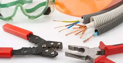 Electrical wiring repair with professional tools and safety equipment in Somerville, MA