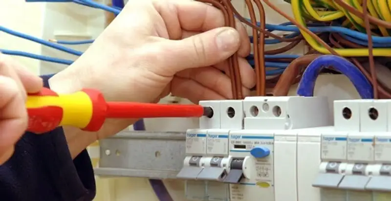 electrician services performing professional electrical panel wiring and connections in Cambridge, MA