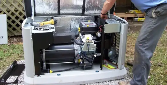 generator installation service showing technician connecting and configuring generator components in Cambridge, MA