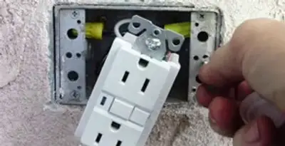 gfci circuits service showing installation of a ground fault circuit interrupter outlet by licensed electricians in Cambridge, MA