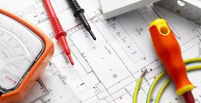 licensed electrician planning and testing electrical systems using professional tools in Cambridge, MA