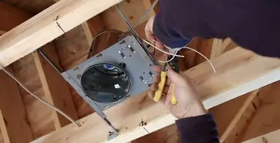 Professional recessed lighting installation with electrical wiring by licensed electricians in Cambridge, MA