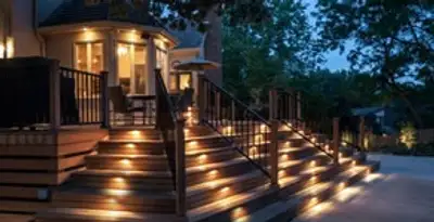 Residential electrician installing outdoor lighting for home safety in Cambridge, MA