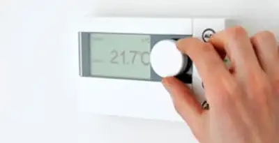 Thermostat installation service with professional adjusting temperature control in Cambridge, MA